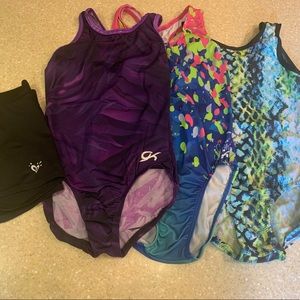 3 adult small leotards and black Justice shorts